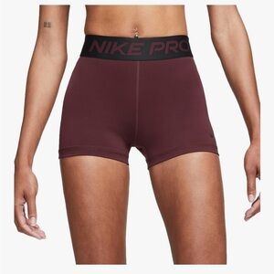 Nike Women's Athletic Shorts in Dark Red